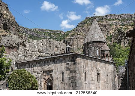 Armenia, the monastery of Gegardavank. The main church of the complex - Katogike surrounded by khachkars gavit (porch) of the church.