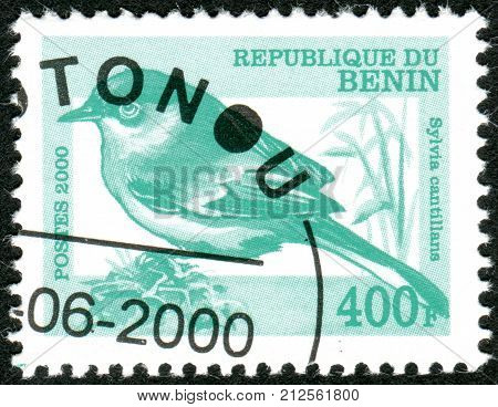 BENIN - CIRCA 2000: A stamp printed in Benin shows a bird Subalpine Warbler (Sylvia cantillans) circa 2000