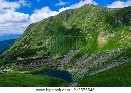 the blue lake Brebeneskul among Carpathians Mountains