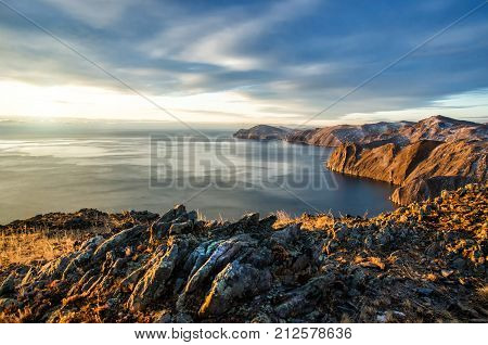 View above big beautiful lake sunrise, Baikal lake, Russia