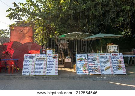 Vang Vieng, Laos - January 19, 2017: Small outdoor cafe in Vang Vieng, Laos