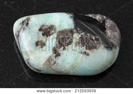 Polished Pegmatite Stone On Dark Background