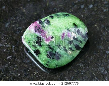 Tumbled Zoisite (anyolite) Gemstone On Dark