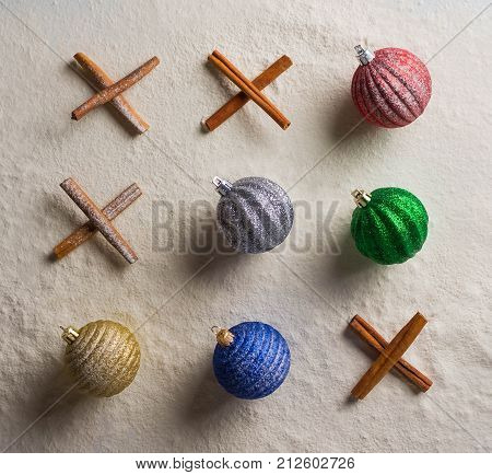 Christmas Ornaments And Spices On Snow Cinnamon Tic Tac Toe Holidays, Celebrations, Fresh, New Year,