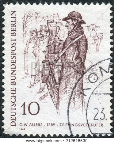 GERMANY - CIRCA 1969: Postage stamp printed in Germany (West Berlin) shows a drawing of "The Newspaper Man" by Christian Wilhelm Allers circa 1969
