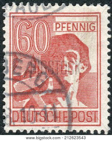 GERMANY - CIRCA 1947: Postage stamp printed in Germany shows the laborer circa 1947