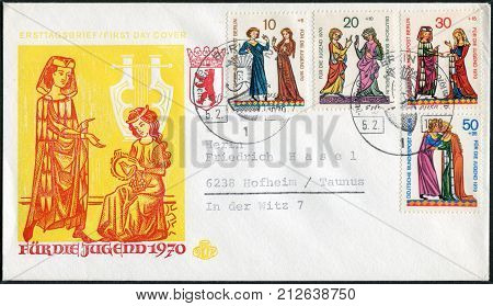 GERMANY - CIRCA 1970: Postage stamp and envelope printed in Germany shows a series of medieval miniatures of young singers. Envelope and stamp first day used to Surtax for benefit of young people circa 1970