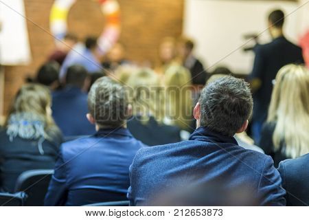Mediation at The Round Table.Group of Professional Mediators Presenting at the Round Table on Stage Before the Audience. Horizontal Image Composition