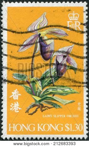 HONG KONG - CIRCA 1977: A stamp printed in the Hong Kong shows Lady's-slipper circa 1977