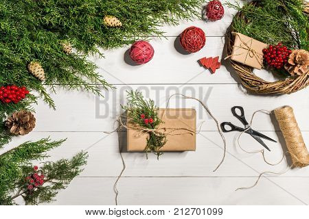 How to make christmas door wreath. The working process. The decorator's workplace. Top view. Copy space. Still life. Flat lay.