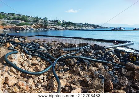 Greece. Workers continue to remove oil that spilled from the tanker Agia Zoni sunk in the Saronic Gulf. Environmental disaster off the coast of the island of Salamis.