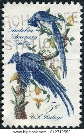 USA - CIRCA 1963: A postage stamp printed in the USA John J. Audubon Issue shows Columbia Jays by design is from a mural by Howard Pyle circa 1963