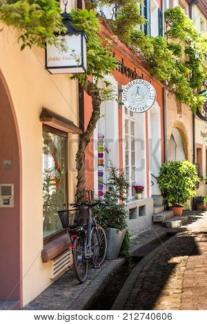 FREIBURG IM BREISGAU, GERMANY - May 17, 2017: old town street in Freiburg, a city in the south-western part of Germany