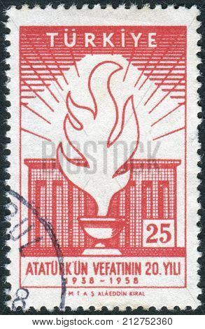 TURKEY - CIRCA 1958: Postage stamp printed in Turkey dedicated to the 20th death annivercary of Kemal Ataturk depicted Flame and mausoleum circa 1958