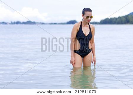 Woman shape big and bikini on beach at Ban Krut Beach Prachuap Khirikhan Province Thailand