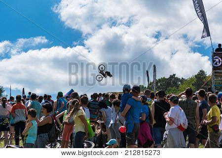 Kalnica, Slovakia - May 27 2017: People Stay, Watch And Support Rider Who Jump In Slopestyle Competi