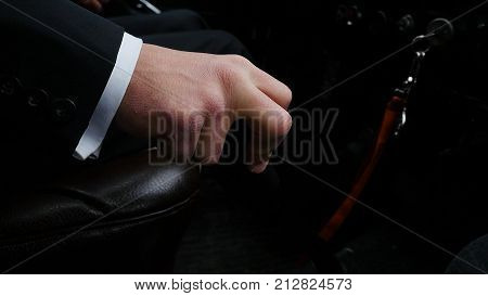 Businessman Driving To Work, Hand Shifting The Gear Stick. Businessman Shifts The Transmission In Th