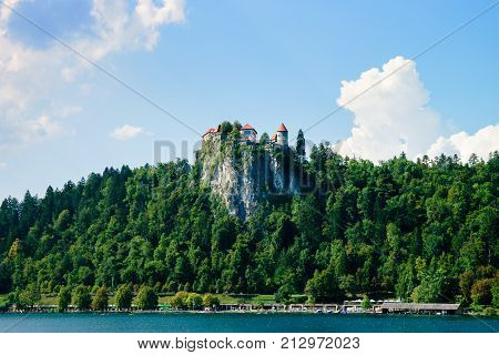 Colorful summer scene on the Bled lake with medieval castle Blejski grad. Slovenia, Europe.