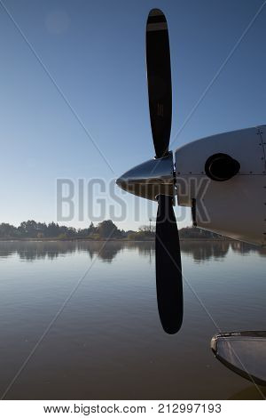 Airplane propeller closeup water surface copy space background