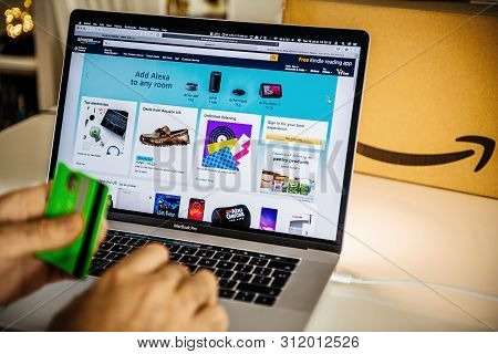 Paris, France - Jul 16 2019: Man Pov Looking At Amazon Australia Prime Day Shopping Deals On Apple M