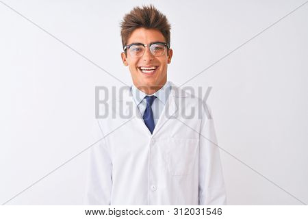 Young handsome sciencist man wearing glasses and coat over isolated white background with a happy and cool smile on face. Lucky person.