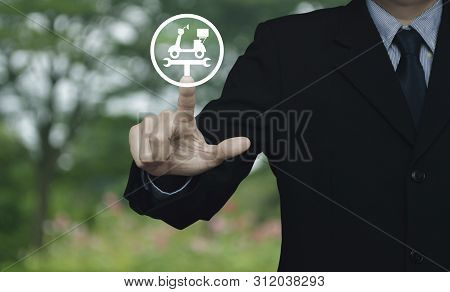Businessman Pressing Service Fix Motorcycle With Wrench Tool Flat Icon Over Blur Flower And Tree In 
