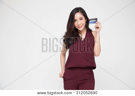 Happy Asian Woman Holding Credit Card Or Cash Advances, Pay Instead Of Money And Specially Curated B