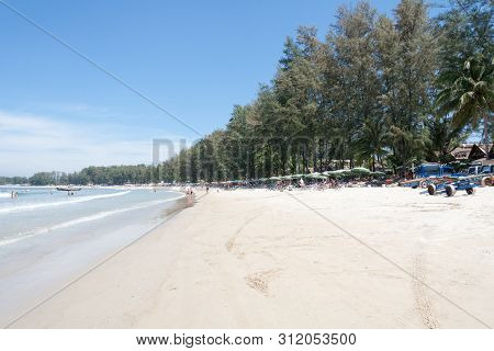 Holidaymakers On The Beach, Bang Tao Beach, Phuket, Thailand