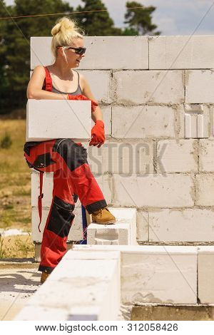 Woman Working With Airbricks