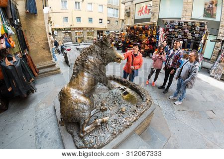 Florence, Italy - May 11, 2019: Fontana Del Porcellino, A Bronze Boar Rubbed By Thousands Of Hands F