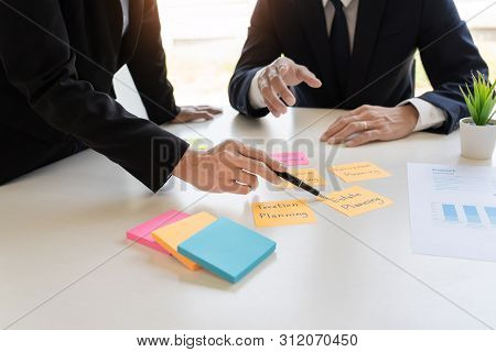Wealth Management Concept, Business Man And Team Analyzing Financial Statement For Planning Financia