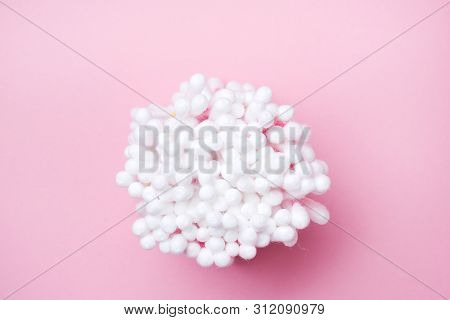 Cotton Buds On Pink Background. Selective Focus Copy Space.