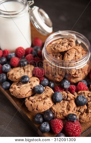 Close Up Photo Of Delicious Chocolate Oatmeal Cookies With Bluebarries
