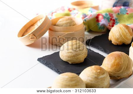 Oriental Food Concept Homemade Organic Huaiyang Spiral Chinese Flaky  Pastry Moon Cake On White Back