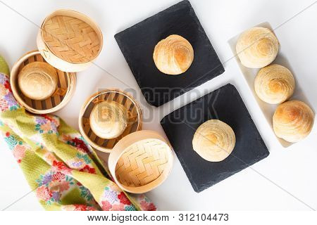 Oriental Food Concept Homemade Organic Huaiyang Spiral Chinese Flaky  Pastry Moon Cake On White Back
