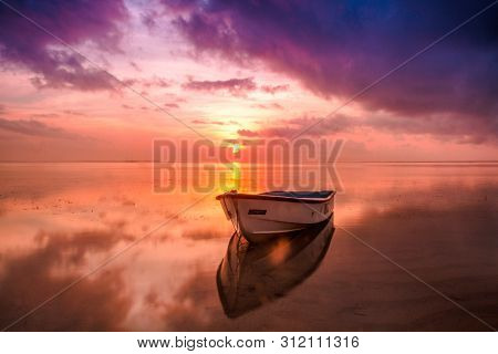 Boat In The Sea, Beautiful Sunset In Backgrund