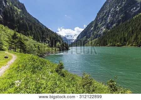 Hiking Trail Around Mountain Lake. Alps Mountains, Stillup Lake, Austria, Tyrol Region