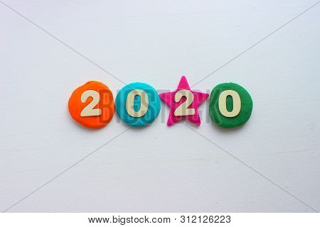 2020 Background .the Concept Of The New 2020. New Year With Colorful Numbers 2020 On White Backgroun