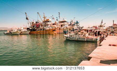 Didim, Turkey - October 03, 2017: Several Commercial Fishing Boats In Town Harbor In Didim, Turkey