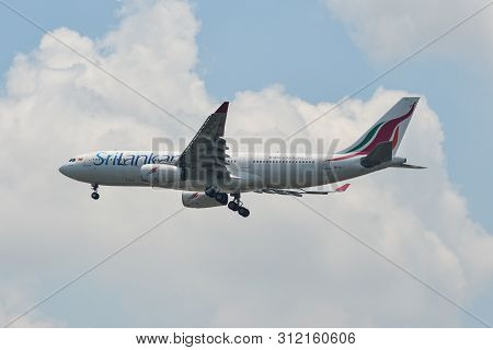 Passenger Airplane Landing At The Airport