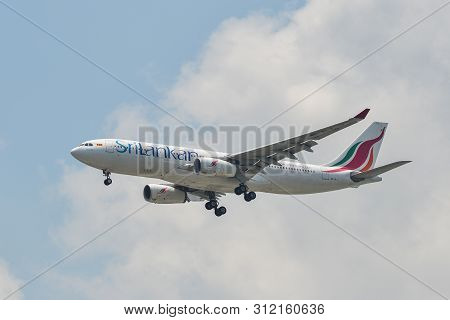 Passenger Airplane Landing At The Airport
