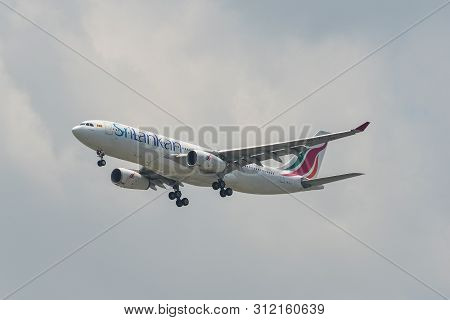 Passenger Airplane Landing At The Airport