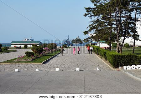 Wonsan, North Korea - May 3, 2019: Marina With  Moored Ships At The Pier And The Promenade Of The Ja