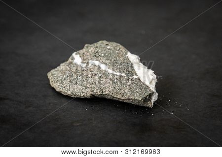 Piece Of Rock Containing Natural Asbestos Parts Found In Nature