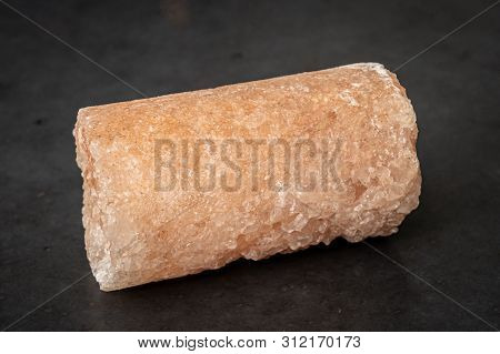 Salt Crystal Drill Probe Containing Minerals Causing Its Pink Color