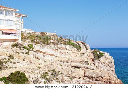 Summer Tropical Resort. Beautiful Vivid Mediterranean Seashore. Salou Platja Capellans Beach, Spain.