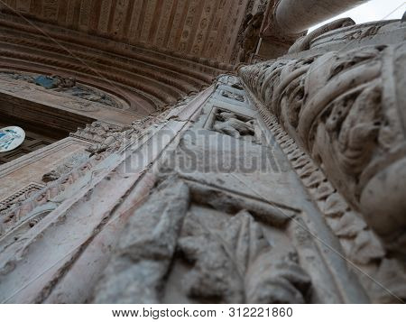 Cathedral Of Verona, External Romanesque Architecture With Bestiaries Carved In Marble