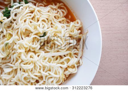 Close Up Dry Tomyum Noodle On Wooden Table
