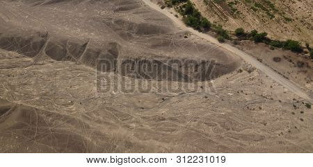 Aerial Airplane Panoramic View To Nazca Plateau With Geoglyph Lines , Ica Region, Peru