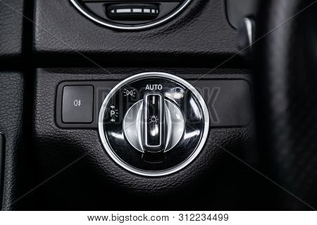 Novosibirsk, Russia - Jule 30, 2019:  Mercedes C-class, Close-up On The Headlight Switch Control But